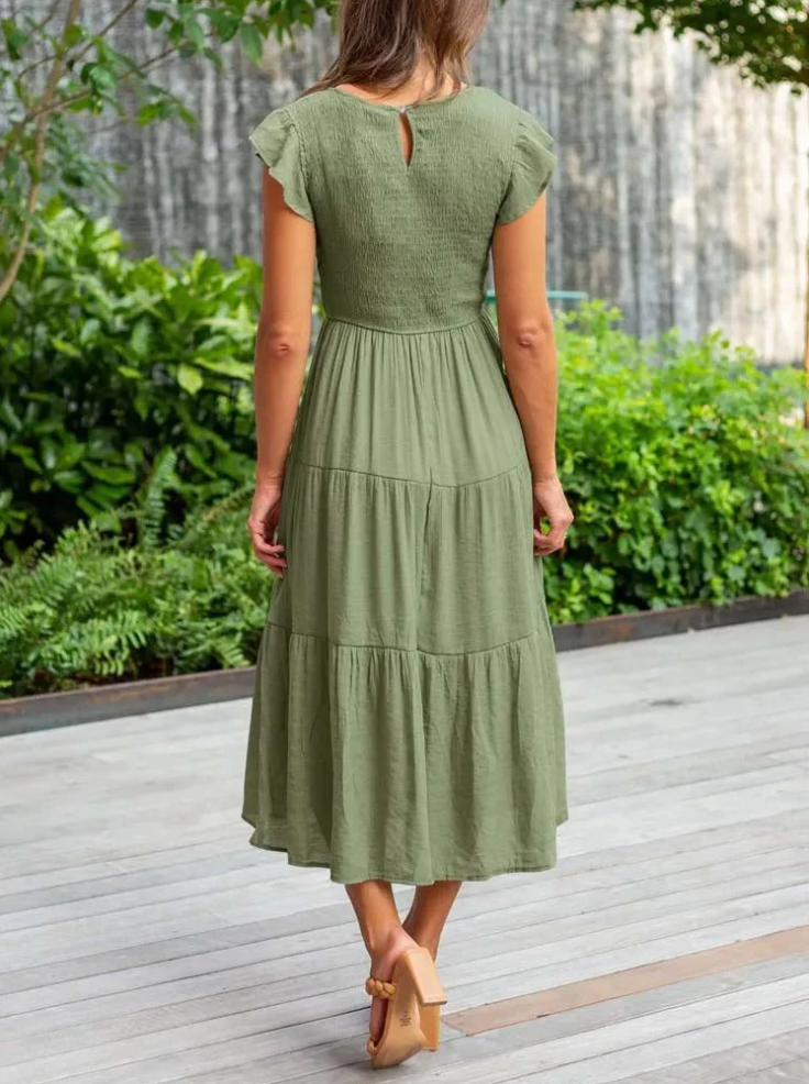 Elegantes sommerkleid - rüschendetails, taschen