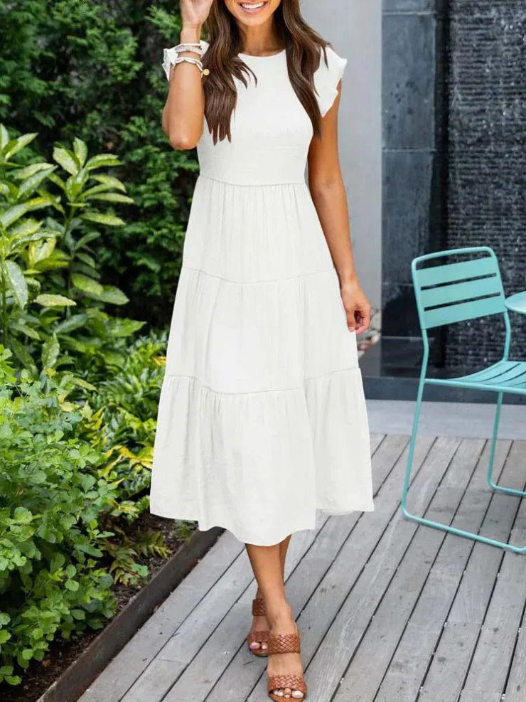 Elegantes sommerkleid - rüschendetails, taschen