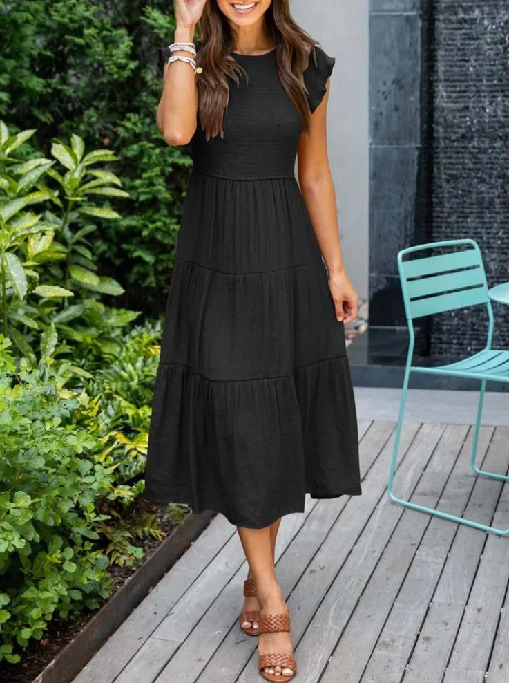 Elegantes sommerkleid - rüschendetails, taschen