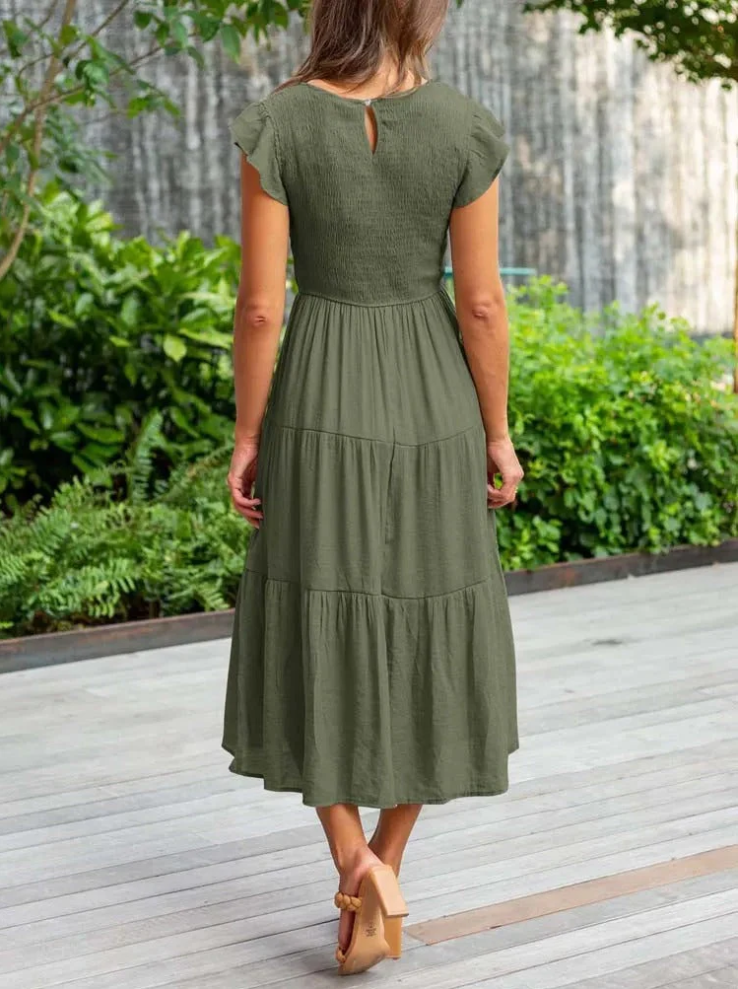 Elegantes sommerkleid - rüschendetails, taschen