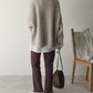 Übergroßer pullover mit elfenbeinfarbener vordertasche und großen, tiefen taschen für damen