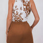 Abigail – elegantes set aus neckholder-top und shorts mit blumenmuster und bindeband