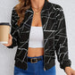 Nahomy – langarmjacke mit geo-print und reißverschluss