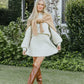 Elegantes set aus plissee-pullover und rock - jayline