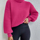 Schicker pullover mit tropfenschulter, laternenärmeln und rollkragen