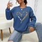 Dindy - stabpulli mit leopardenherz-print