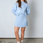 Elegantes set aus plissee-pullover und rock - jayline