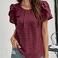 Charlotte – swiss dot-bluse mit blütenblattärmeln