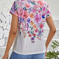 Aurora – t-shirt mit blumendruck und rundhalsausschnitt für den frühling