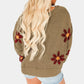 Honoria – damenpullover aus floralem strick