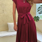Elegantes sommerkleid mit taillenbund und fließender a-linie