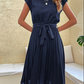 Elegantes sommerkleid mit taillenbund und fließender a-linie