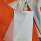 Harper – orangefarbenes midikleid mit halben armeln und v-ausschnitt