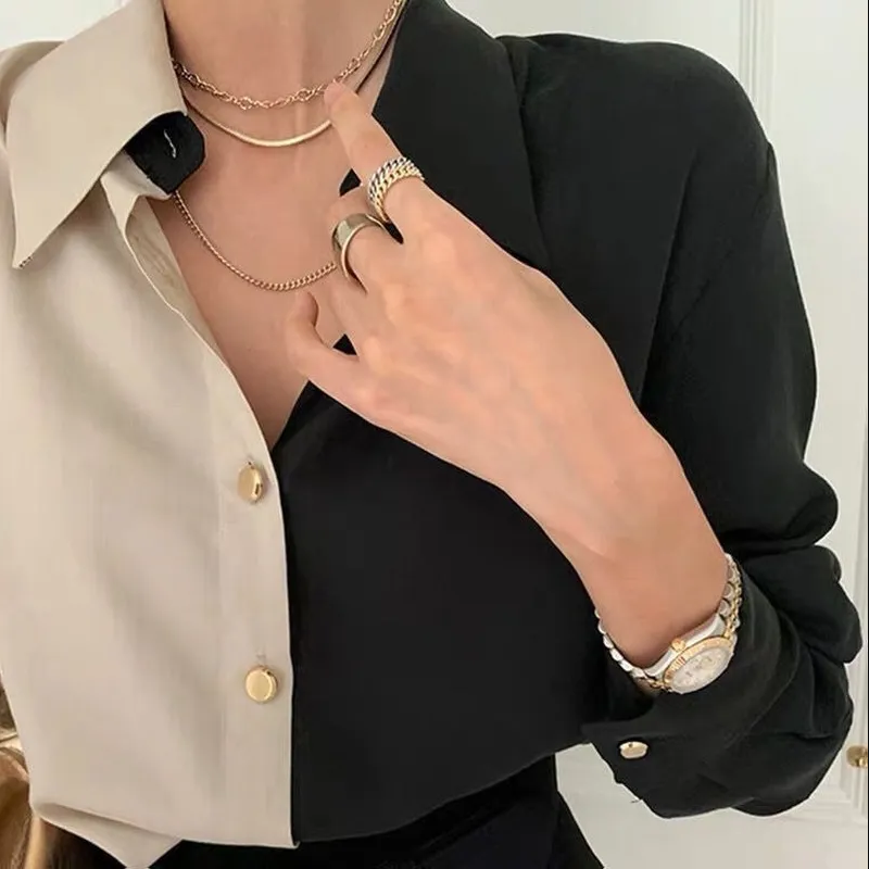 Zweifarbige vintage-langarmbluse für damen