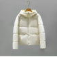 Warmer damen-wintermantel 2024: eleganter puffermantel-trend